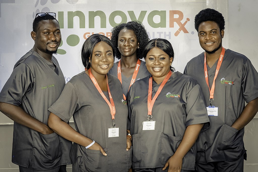 A group of RN standing together wearing scrubs