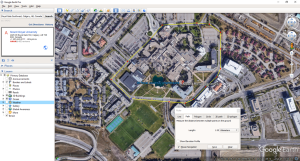 Figure T5: Using the ruler tool to measure the length of a path, rather than a simple straight line. The length of a path drawn around the ring road of MRU is 1.55 km (see yellow path on image).