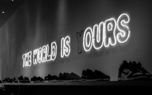 the world is yours LED sign with the y burnt out.