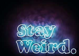 stay weird neon sign