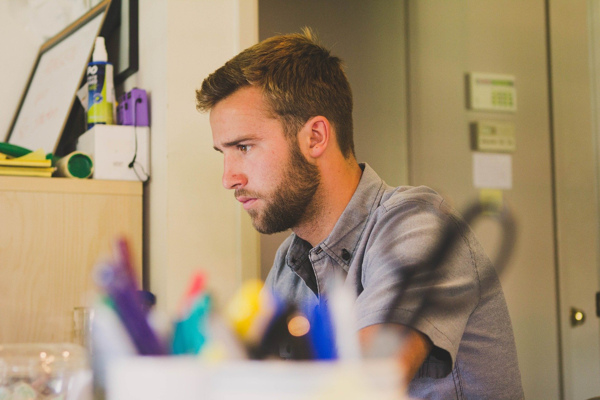 man working at his desk