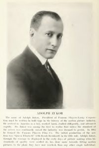 Photograph of Adolph Zukor accompanied by a brief biography on printed paper