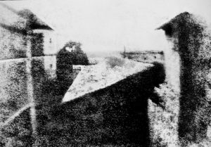 Grainy early photograph showing the view from Niépce’s window at Le Gras