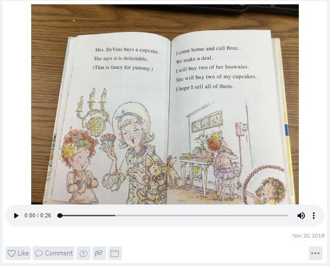 An still image from a video of student reading.