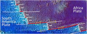 Figure 1.2.6: A part of the mid-Atlantic ridge near the equator. The double white lines are spreading ridges. The solid white lines are fracture zones. As shown by the yellow arrows, the relative motion of the plates on either side of the fracture zones can be similar (arrows pointing the same direction) or opposite (arrows pointing opposite directions). Transform faults (red lines) are in between the ridge segments, where the yellow arrows point in opposite directions.