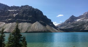 Figure 5.1.2: An area with very effective frost-wedging along glacial-fed Bow Lake in Banff National Park. The fragments that have been wedged away from the cliffs above have accumulated in a talus deposit at the base of the slope. 