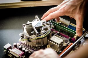 Descriptive image showing the close up of a computer’s motherboard.