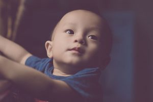 A young infant looking up