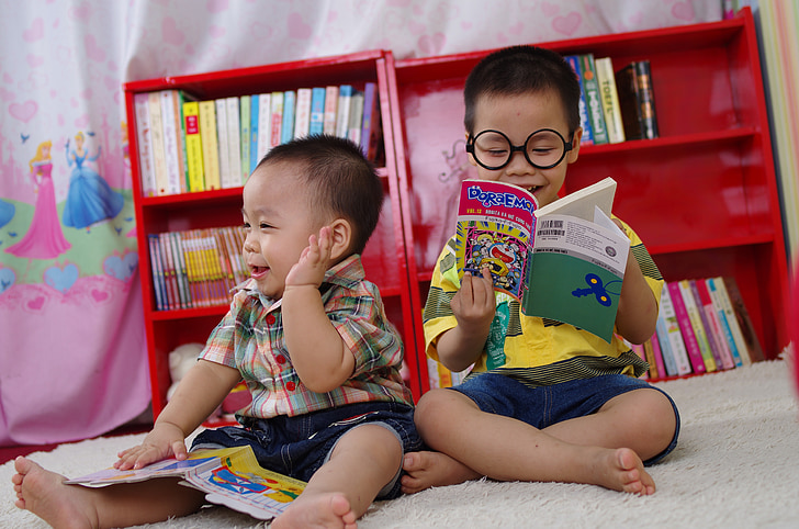 Two boys reading